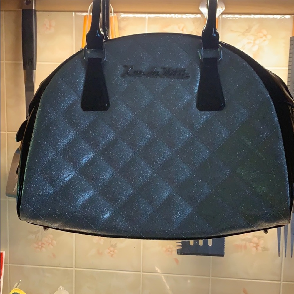 Silver and black purse